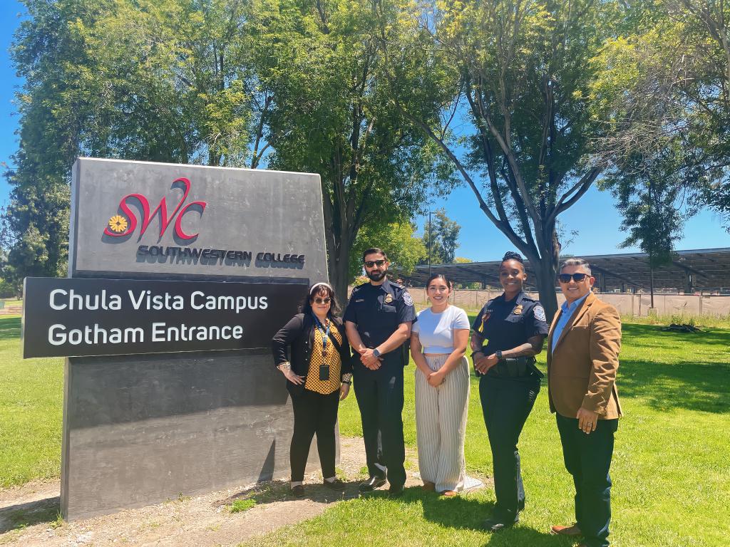 Photo of SWC administrators posing alongside U.S. Custom and Border Protection Officers outside the Chula Vista campus.