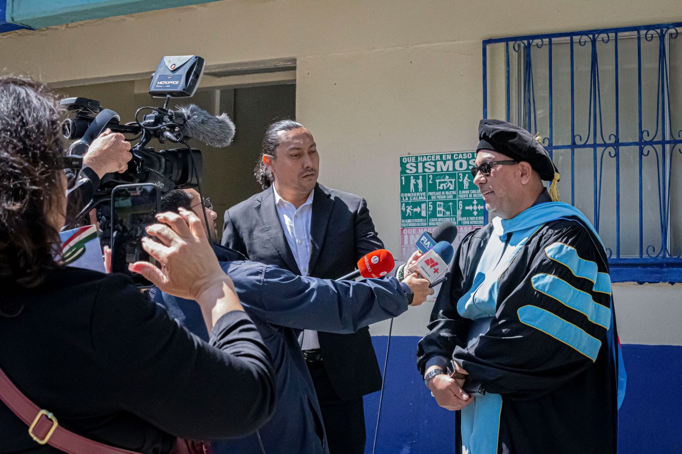Dr. Mark Sanchez, SWC President, giving interviews at the first Binational/Fronterizo Commencement Ceremony in Tijuana in June 2023.